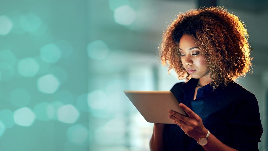 Woman looking for job using her tablet